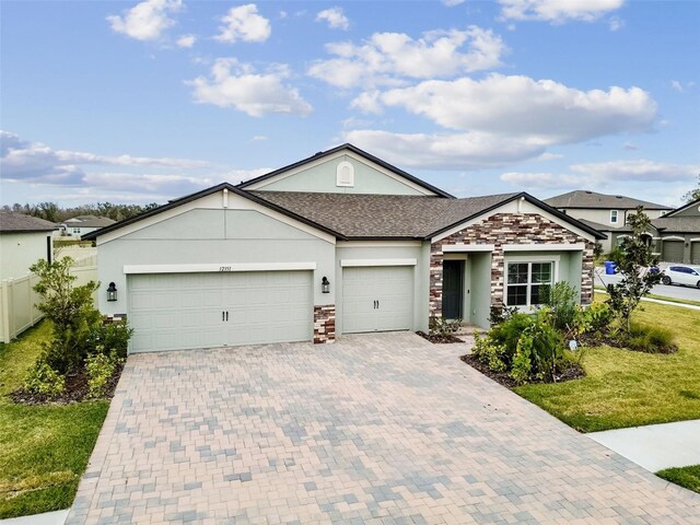 ranch-style home with a garage