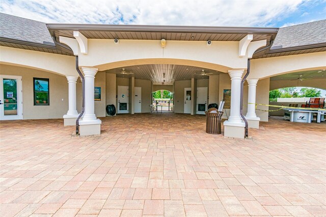 back of house with a patio and ceiling fan