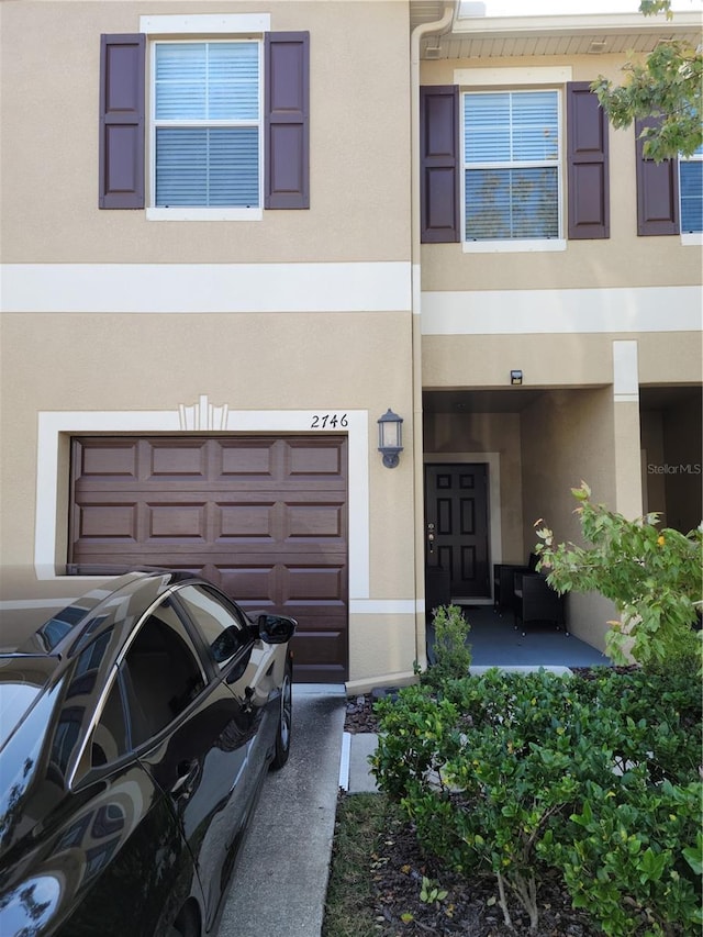 view of property featuring a garage