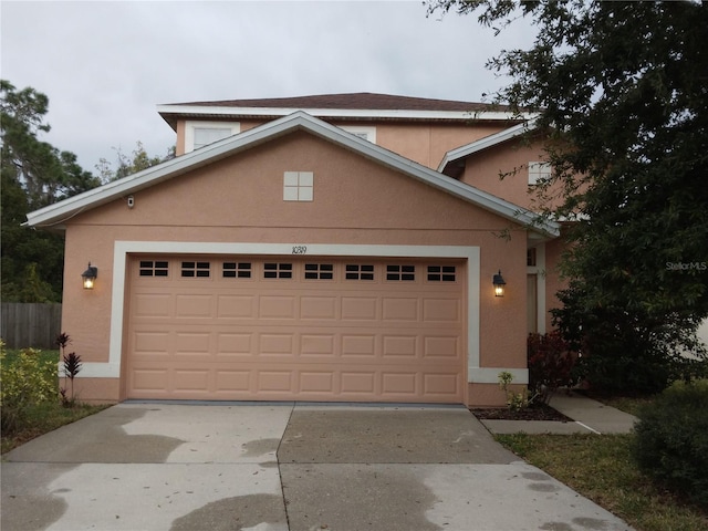 view of property featuring a garage