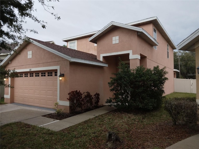 view of front of home with a garage