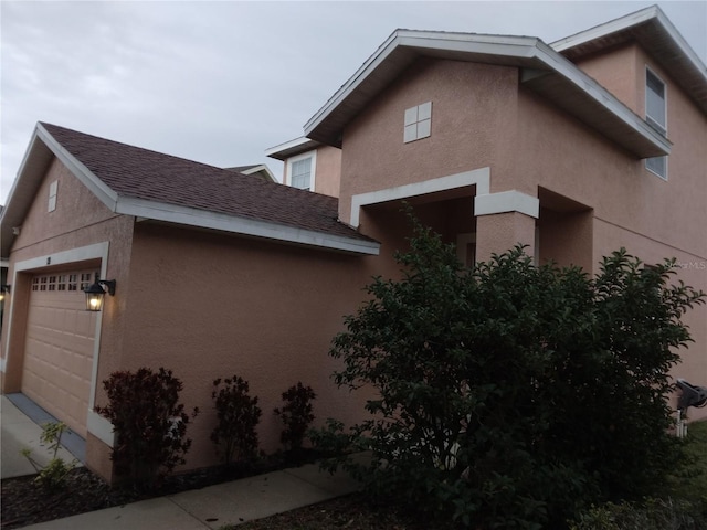 view of home's exterior featuring a garage