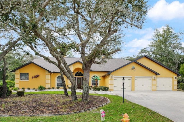 single story home featuring a garage