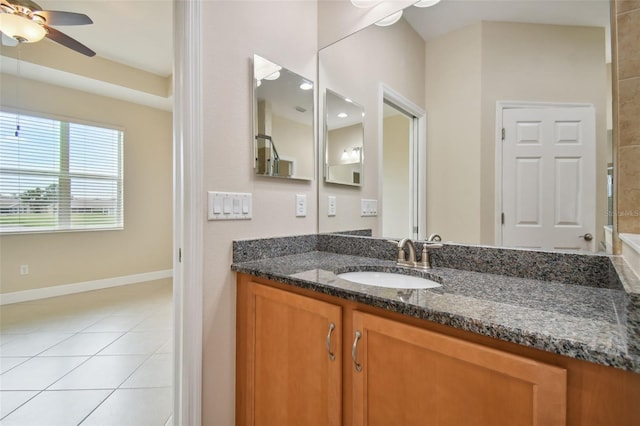 bathroom with vanity, tile patterned flooring, and ceiling fan