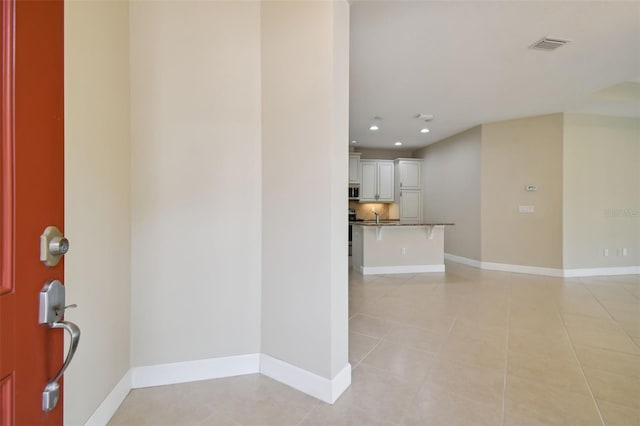 view of tiled spare room