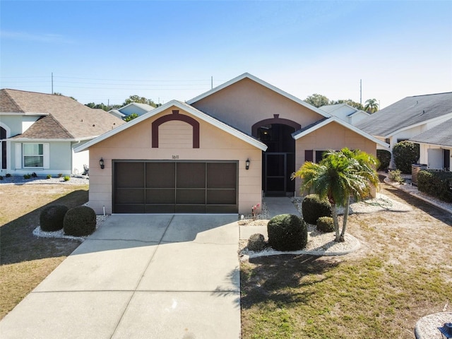 ranch-style house featuring a garage