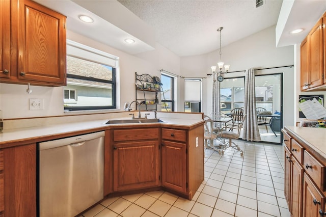 kitchen with pendant lighting, an inviting chandelier, light tile flooring, dishwasher, and sink