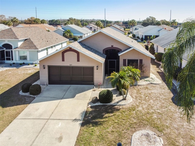 single story home with a garage