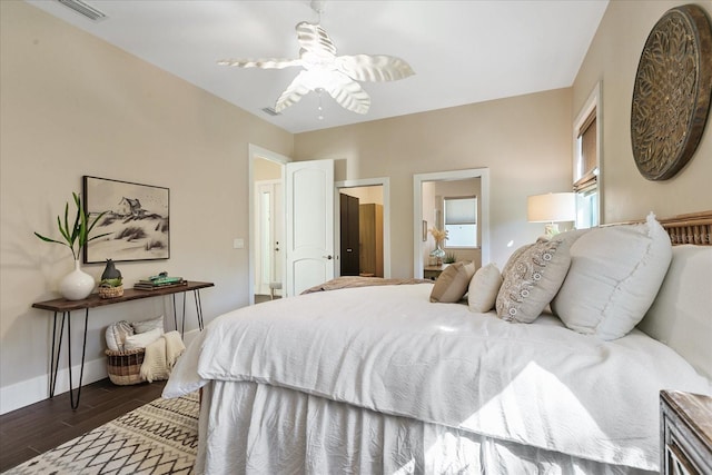 bedroom featuring dark hardwood / wood-style flooring and ceiling fan