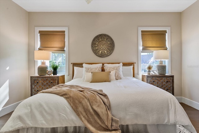 bedroom featuring dark hardwood / wood-style flooring