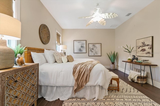 bedroom featuring dark hardwood / wood-style flooring and ceiling fan