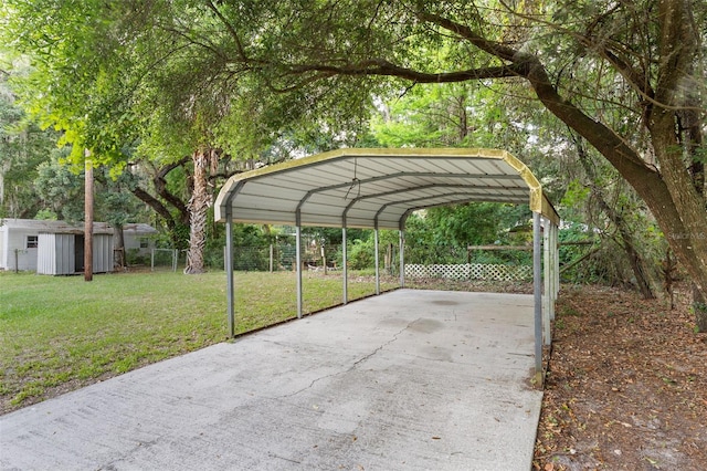 view of parking / parking lot featuring a carport and a lawn