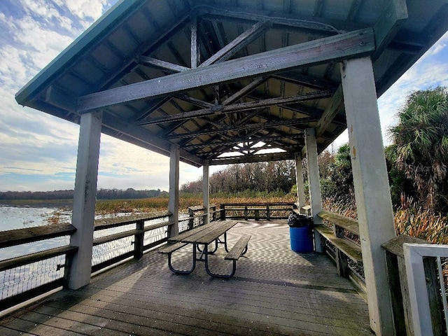 deck featuring a water view