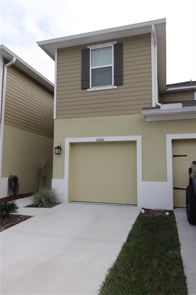 view of front of home with a garage