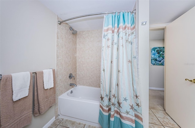 bathroom with tile floors and shower / tub combo