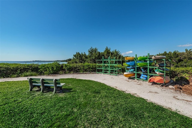 view of playground featuring a lawn