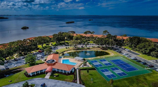 birds eye view of property featuring a water view