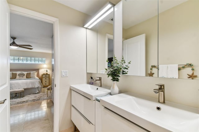 bathroom featuring vanity, ceiling fan, and tile patterned floors