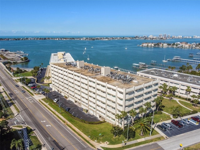 birds eye view of property with a water view