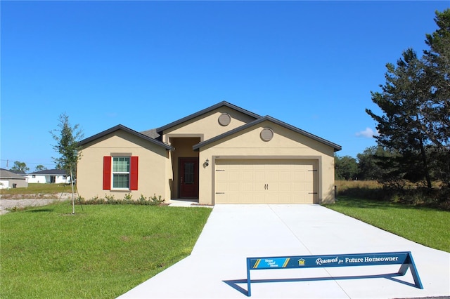 single story home with a front yard and a garage