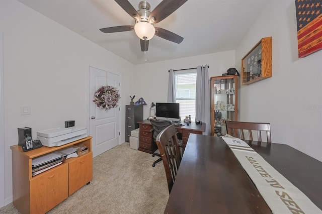 office area featuring light colored carpet and ceiling fan