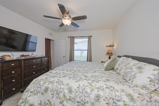 carpeted bedroom featuring ceiling fan