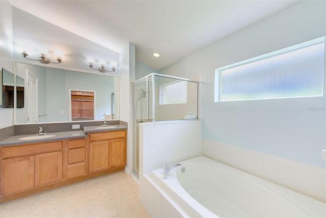 bathroom with shower with separate bathtub, dual bowl vanity, and tile floors