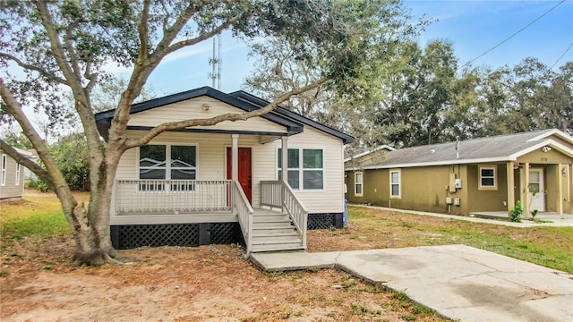 bungalow-style house featuring covered porch