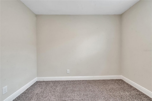 spare room featuring carpet floors