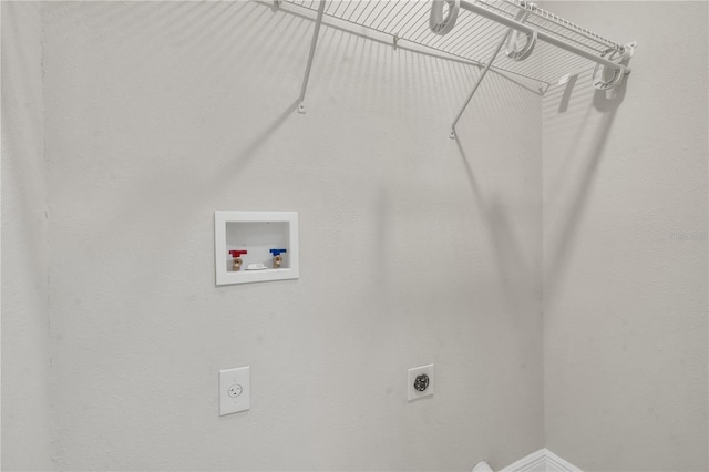 laundry room featuring electric dryer hookup and washer hookup