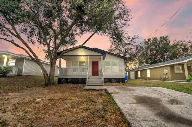 view of front of home featuring covered porch