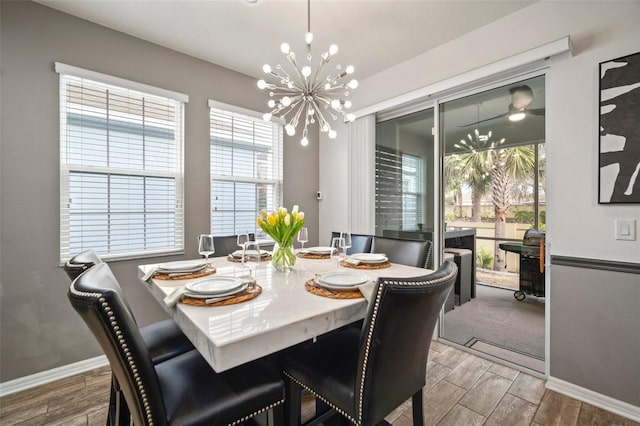 dining area with a notable chandelier