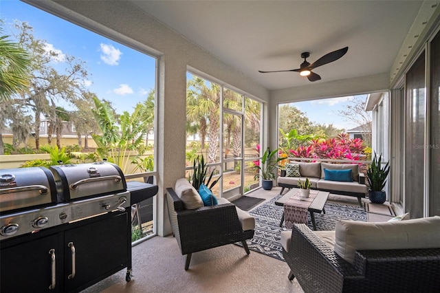 sunroom / solarium with ceiling fan and a wealth of natural light