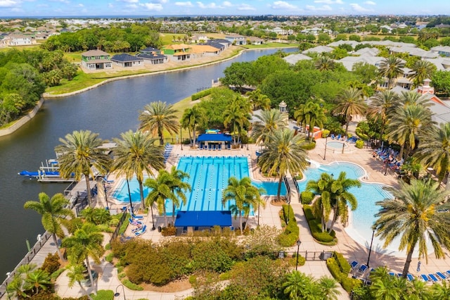 birds eye view of property with a water view