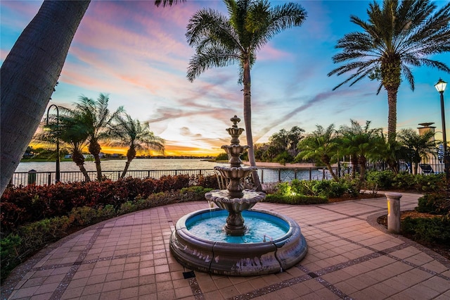 patio terrace at dusk with a water view