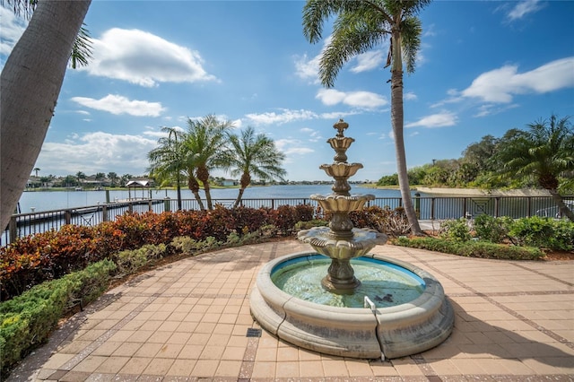 view of patio featuring a water view