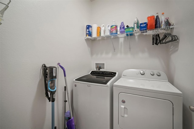 washroom featuring independent washer and dryer