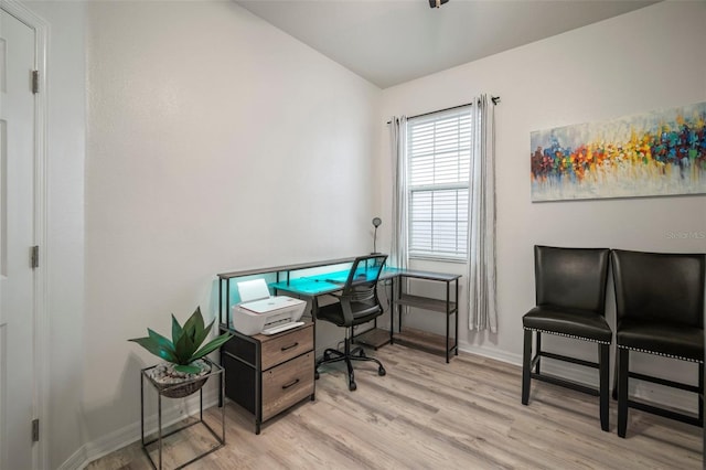 home office featuring light wood-type flooring