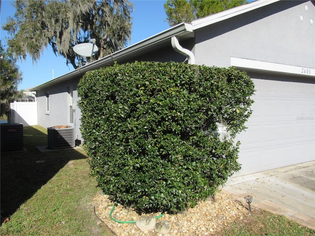 view of property exterior with cooling unit