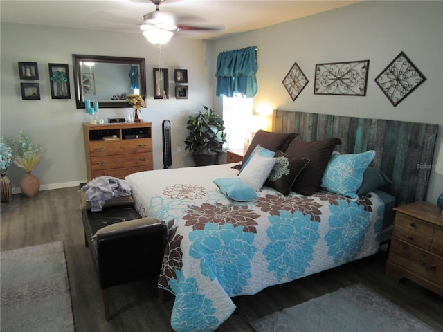 bedroom with hardwood / wood-style floors and ceiling fan