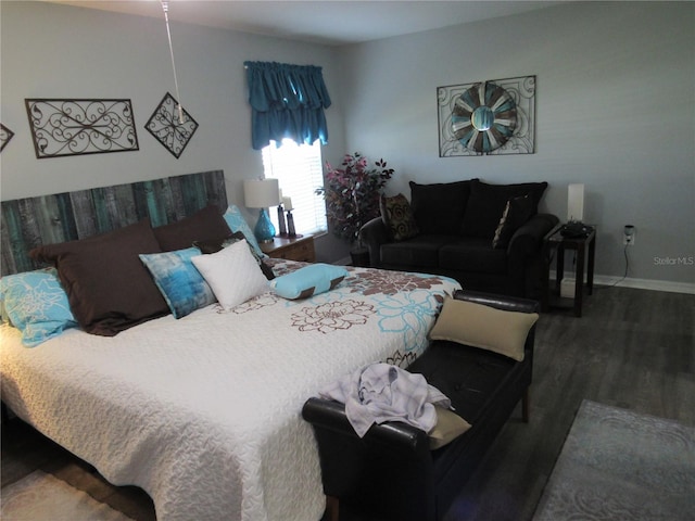 bedroom featuring wood-type flooring