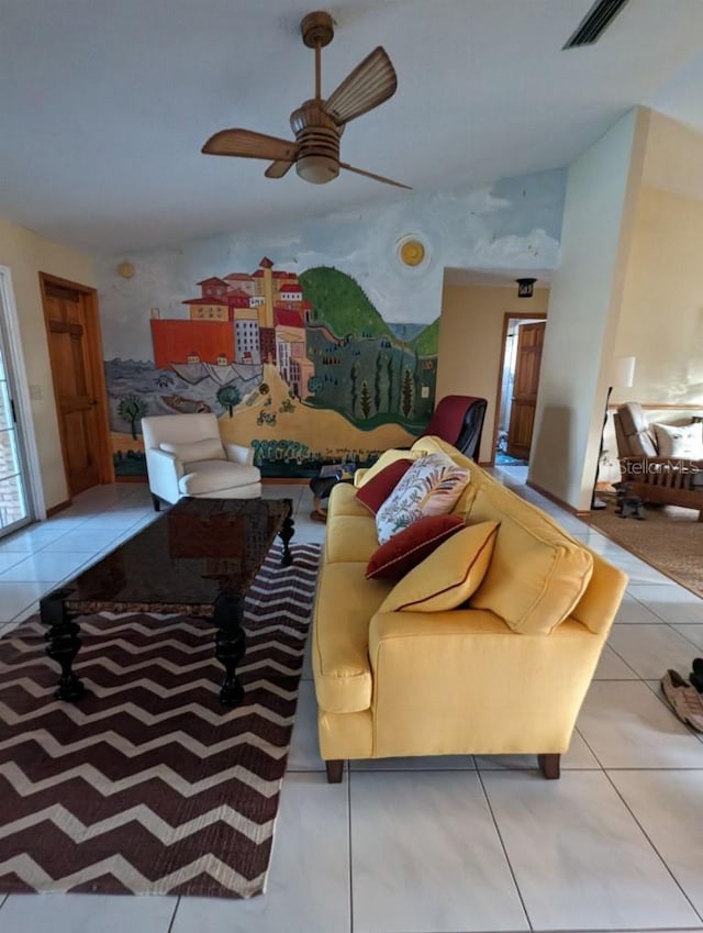 living room featuring ceiling fan and light tile floors