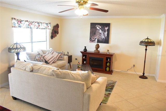 tiled living room featuring ornamental molding, a textured ceiling, and ceiling fan