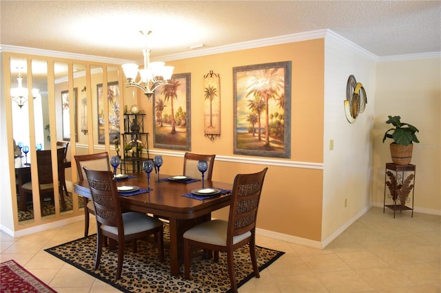 tiled dining area with ornamental molding, a notable chandelier, and a textured ceiling