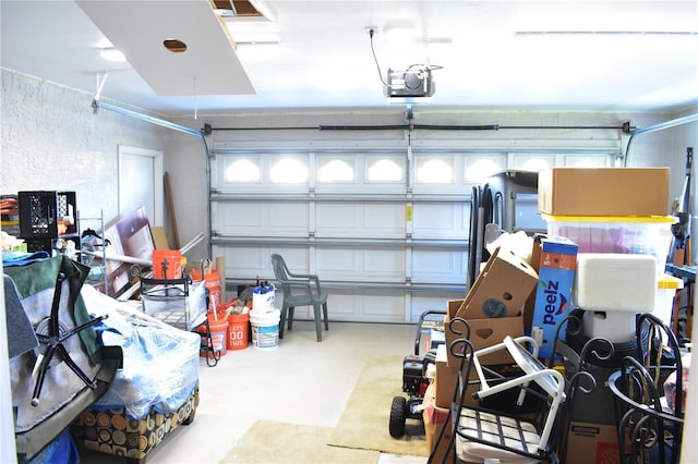 garage featuring a garage door opener