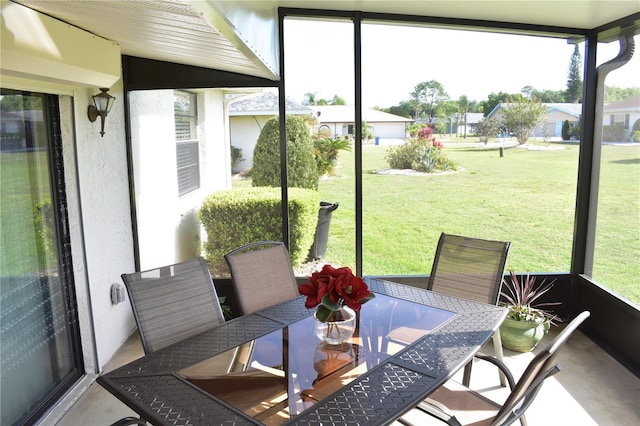 sunroom / solarium featuring a wealth of natural light