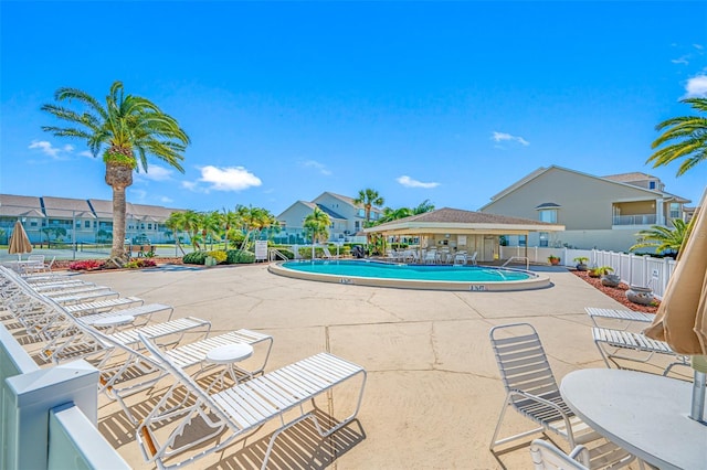 view of swimming pool with a patio area