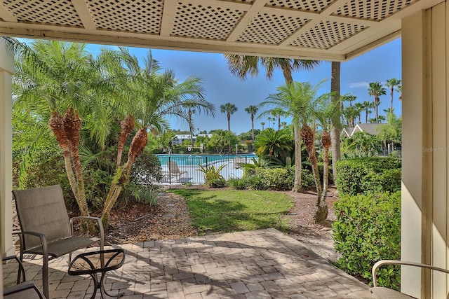 view of patio with a community pool