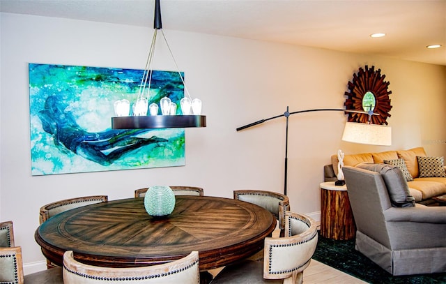 dining area with light hardwood / wood-style flooring