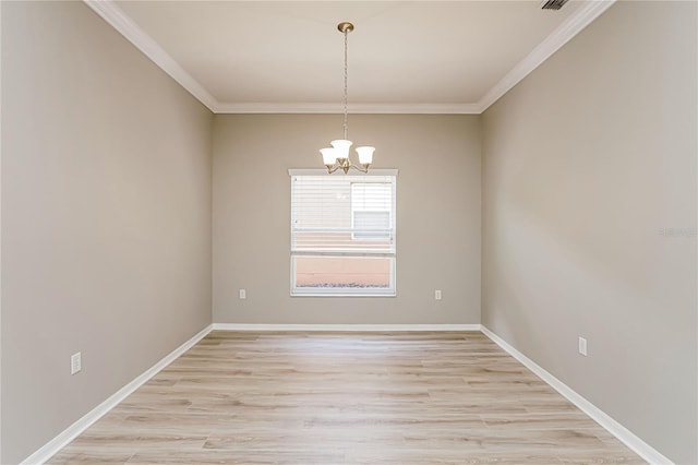 unfurnished room with a notable chandelier, light hardwood / wood-style floors, and crown molding